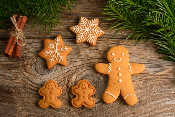 istock gingerbread cookies on wooden background 892355098