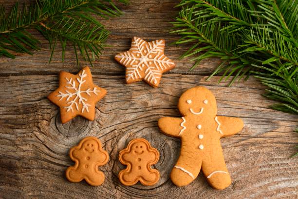 istock gingerbread cookies on wooden background 892356198