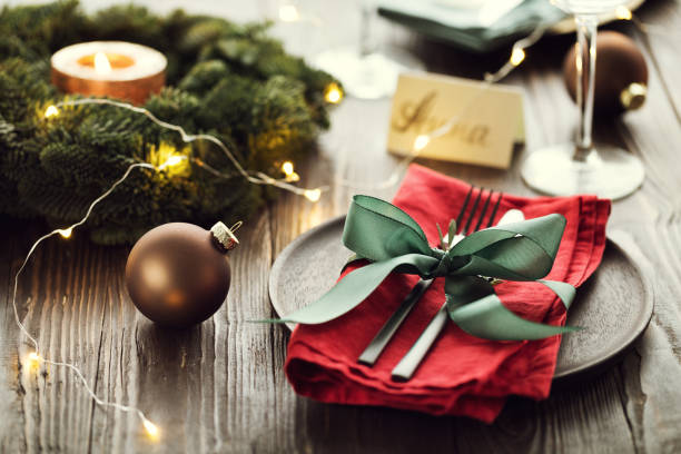 istock Plate with napkin and fork served on wooden table. 892363194