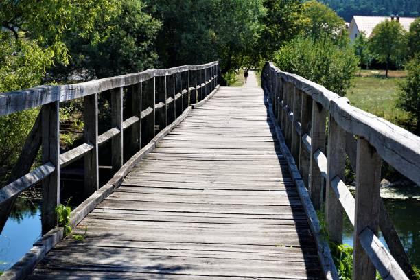 istock Bridge over the Krka river in Kostanjevica na Krki 892365780