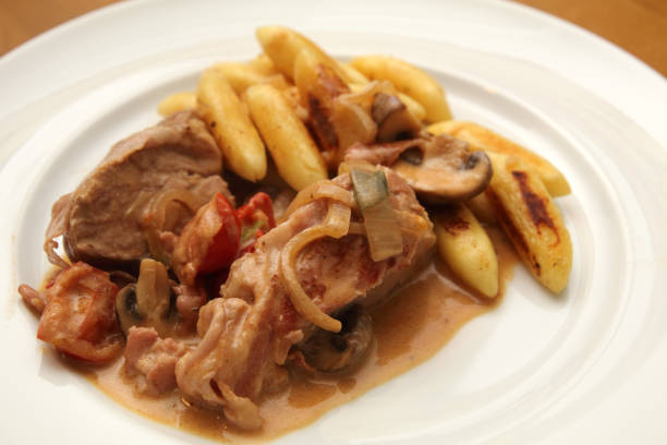 istock Pork fillet with schupfnudeln