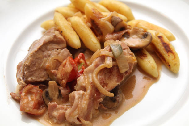 istock Pork fillet with schupfnudeln 892369342