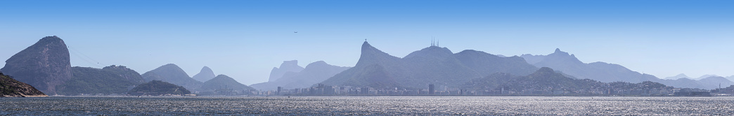 Panoramic view of Rio de Janeiro with Sugarloaf and Guanabara Bay in summer seen from Niteroi