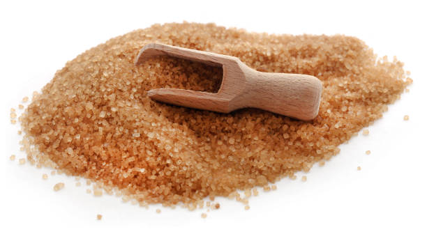 istock Brown sugar with wooden scoop 892392198