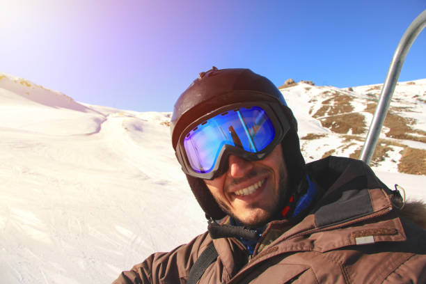 istock Skier man portrait in safe ski equipment 892397530