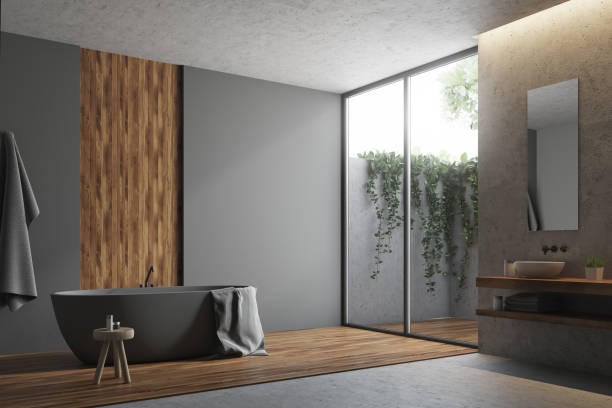 istock Gray and wooden bathroom corner 892398218
