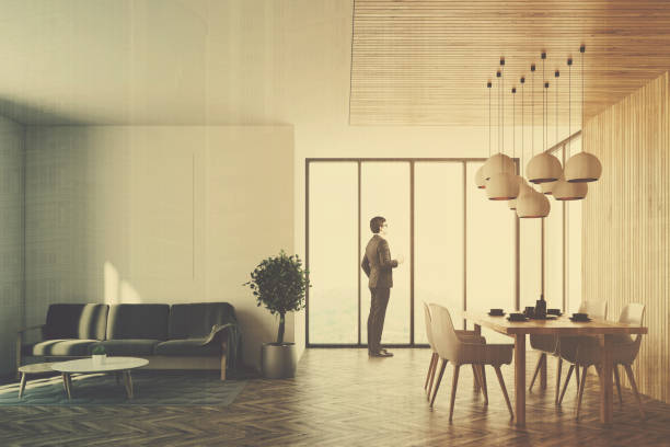 istock White living room interior, sofa and table toned 892400908