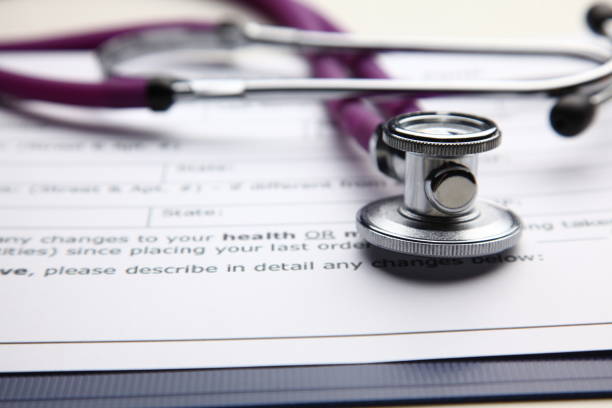 istock Closeup of a medical stethoscope with folder 892422976