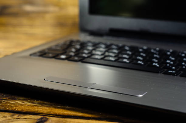 istock Laptop on wooden table 892435958
