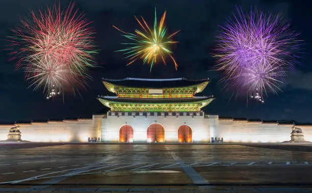 Seoul 2018 New year 2018 celebration fireworks with Traditional Motifs of Gyeongbokgung Palace at night in Seoul, South Korea.
