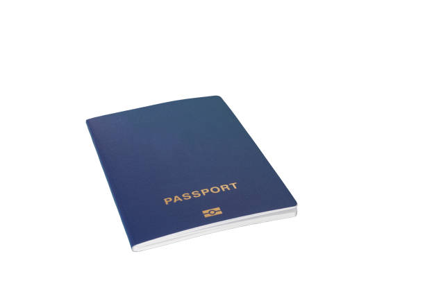 istock a foreign passport with a paper airplane on a blue background, isolate on a white background 892436540