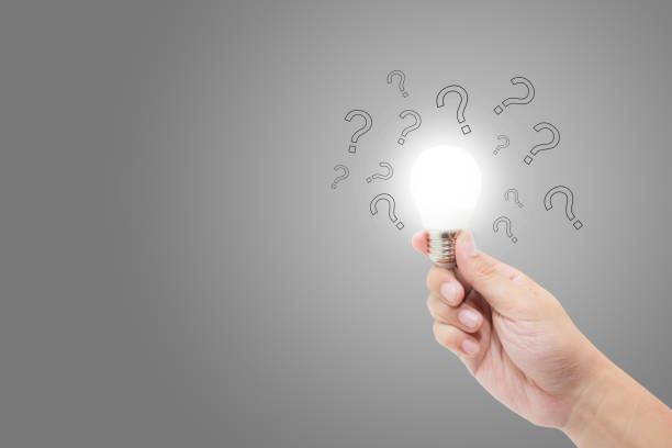 istock Hand with light bulb and question mark for solution, inspiration and brainstorm, problum and analysis, new idea and imagination of success concept. 892460594