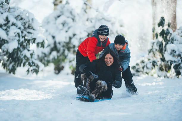 istock Snowy playground with mom! 892460640