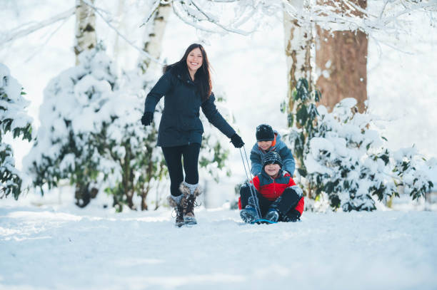 istock Snowy playground with mom! 892460646