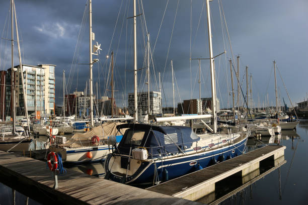 istock Ipswich waterfront marina with storm clouds 892465300