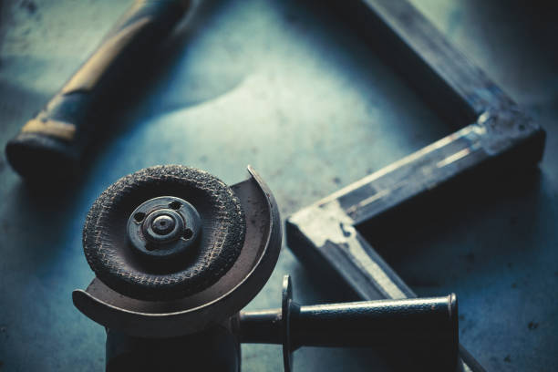 Portraits of a young man welding and grinding steel Portraits of a young man welding and grinding steel. Shallow DOF. welder engineering construction bright stock pictures, royalty-free photos & images