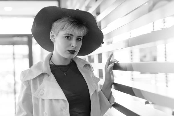 istock Young woman in a cafe waiting 892496178