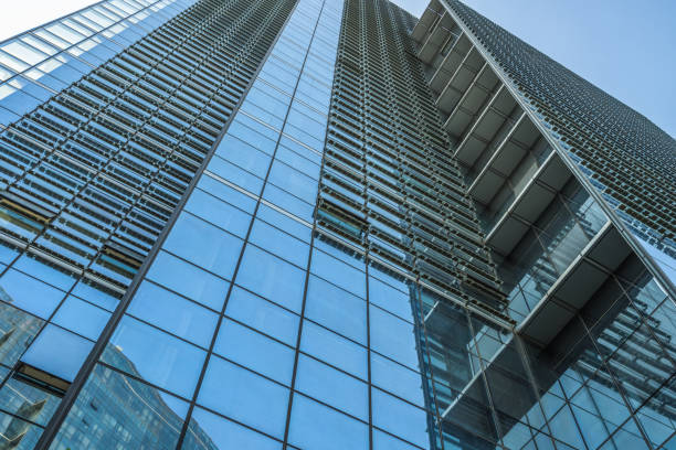 istock Low angle view of modern metallic skyscrapers 892501488