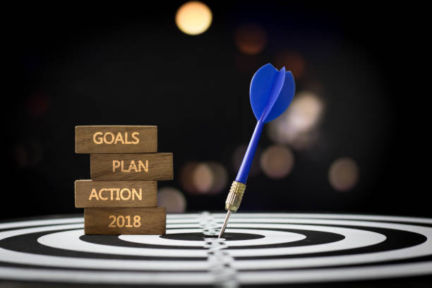 istock Goal, mission and possible in 2018 concept, dart on board with sunset background 892502252