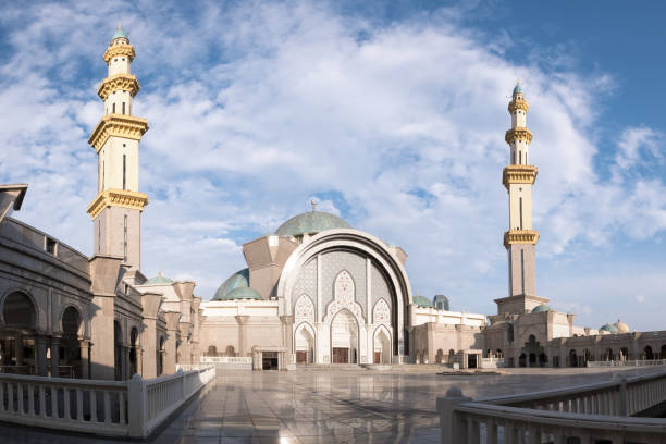 istock View of public mosque with blue sky 892502298