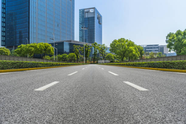 istock City road through modern buildings in china 892511474