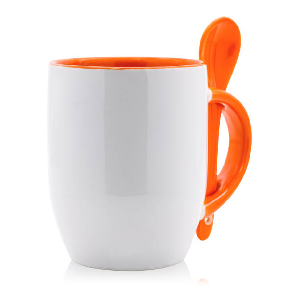 istock Blank coffee mug and spoon isolated on white background. Empty tea cup for your design. ( Clipping paths ) 892516158