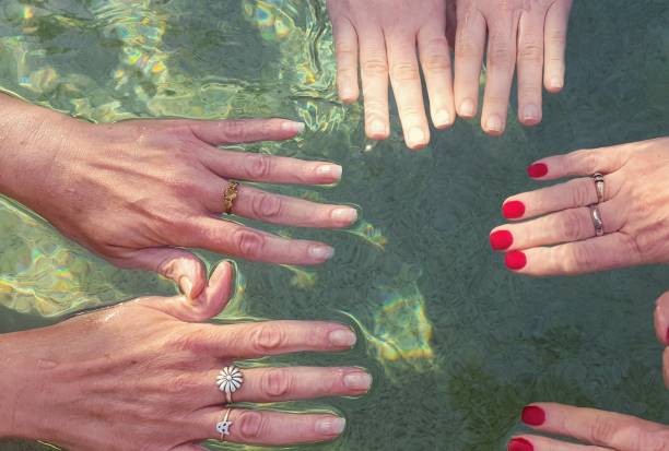 istock Woman's hands, exercising in swimming pool. 892521710