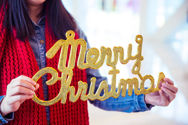 woman holding Christmas card