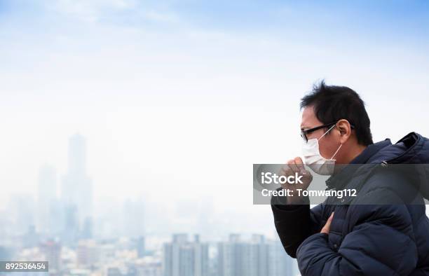 Lung Cancer Patients With Smog City Background Stock Photo - Download Image Now - City, China - East Asia, Pollution