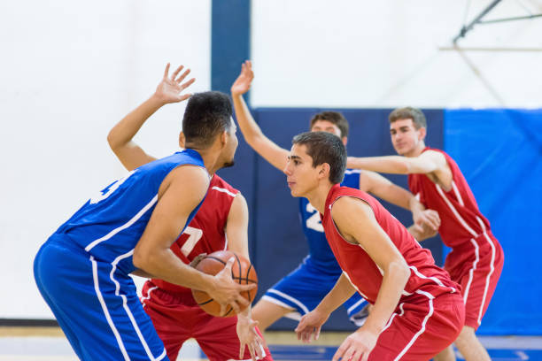 istock Action-Packed Boy's High School Basketball Game 892536500