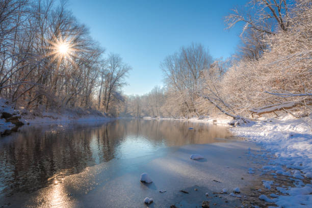 Winter scene on the creek Sunny morning of December at Tyler State Park in Bucks County, Pennsylvania, USA snow river stock pictures, royalty-free photos & images