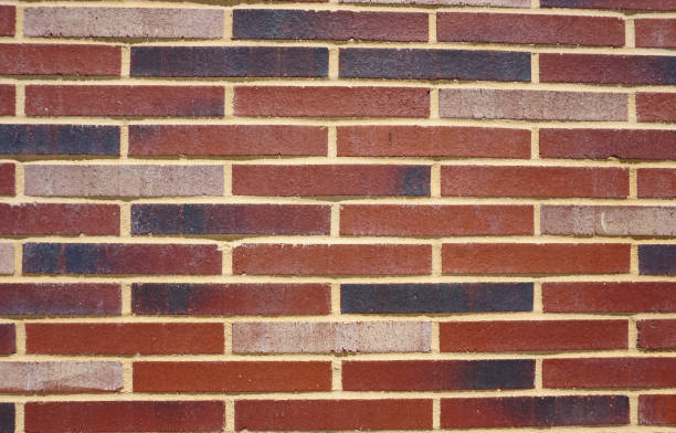 istock Close Up Of Multi-Colored Brick Wall 892545560