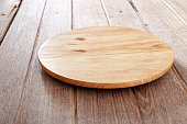 Wood cutting board on wooden background