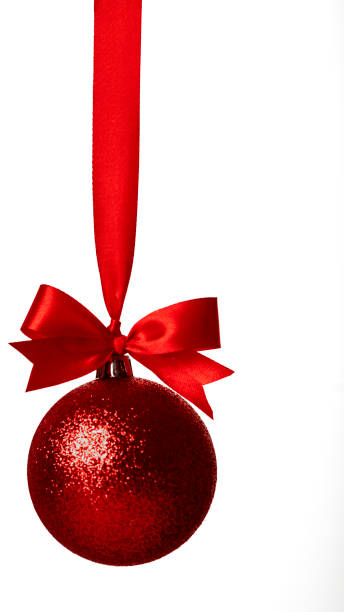 istock Red christmas ball with red bow over white 892553548