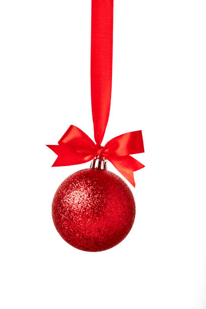 istock Red christmas ball with red bow over white 892553578