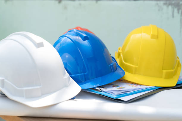 istock Safty helmet for protect head for architect or civil engineer or construction worker use in building site 892555754