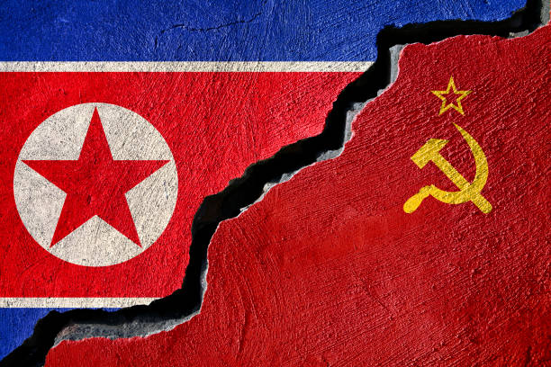 istock Concept North Korea and Russia flag on cracked background 892556518