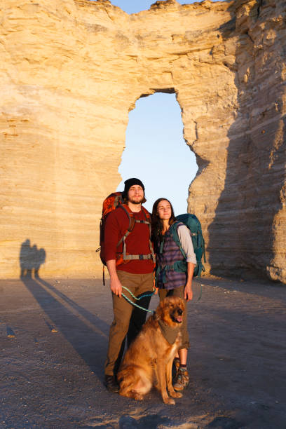 istock Couple hiking together in the wilderness 892596034