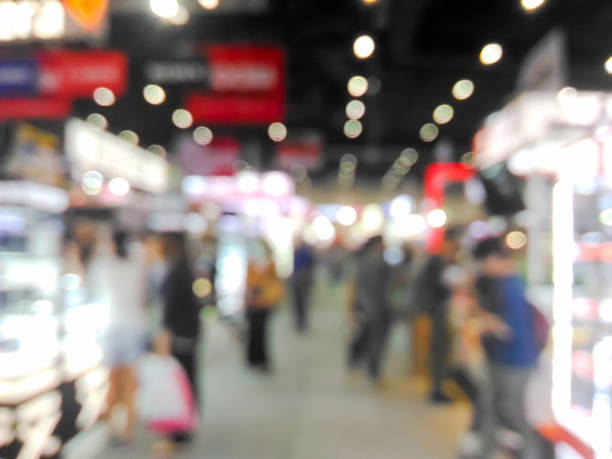 istock Blurred fair trade and people with colorful bokeh 892604032