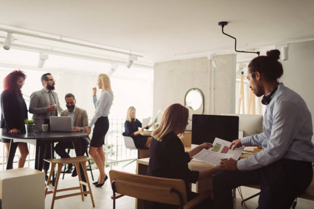 istock Businesspeople In The Modern Office 892634436