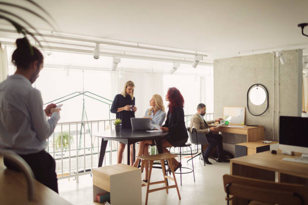 istock Women Working Together In The Modern Office 892634582