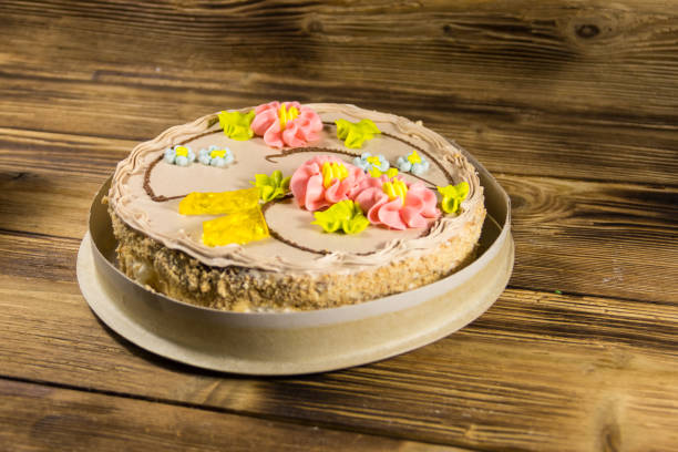 istock Cardboard box with Kiev cake with cream, nuts and meringue 892638946