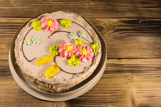istock Cardboard box with Kiev cake with cream, nuts and meringue 892638948