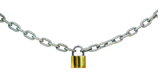 Photo of Length of steel chain fastened by brass padlock