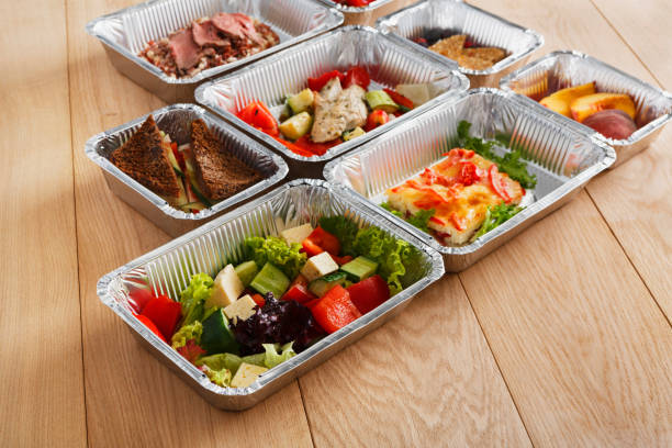 istock Healthy food in boxes, diet concept. 892663406