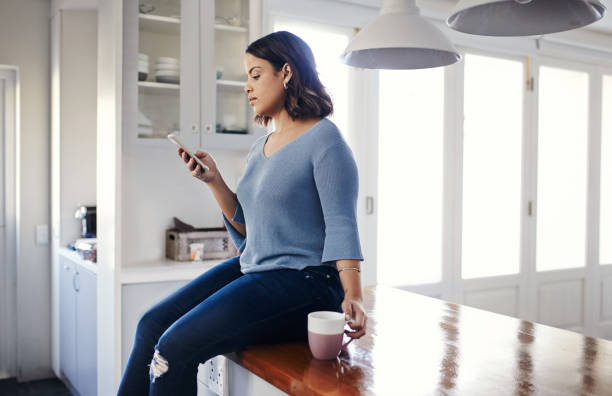 istock Connected from the comfort of her kitchen 892674290
