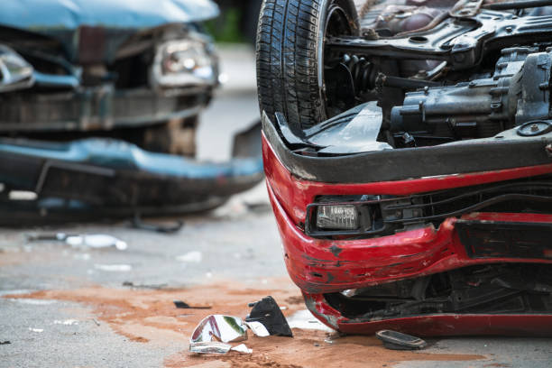 Firefighters At A Car Accident Scene stock photo