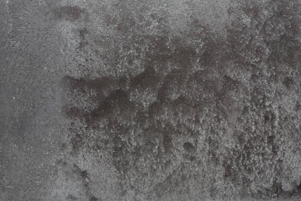 istock Textured surface of old building wall with stains 892686448
