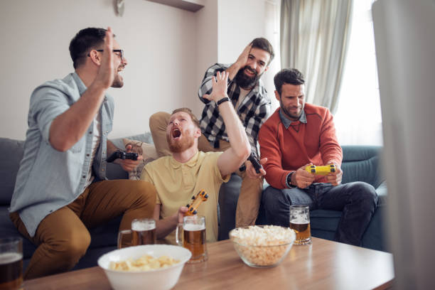 istock Group of friends watching sport together 892687094