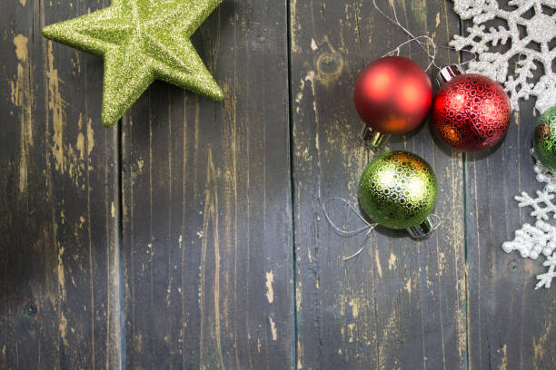 istock Christmas Holiday Ornaments on a Dark Wood Background. 892706384
